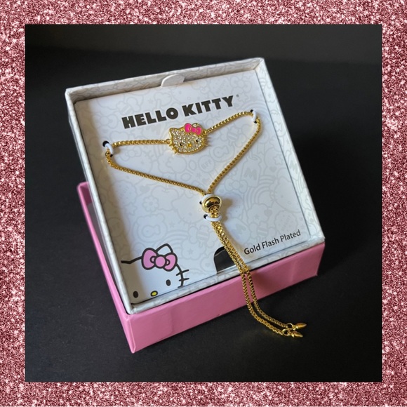 Hello Kitty Jewelry - ✨🎀✨ Hello Kitty pave gold plated lariat bracelet with pink enamel bow 🎀